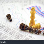 Fin Chess stock-photo-photos-chess-pieces-with-graphs-and-numbers-in-the-tables-367650578