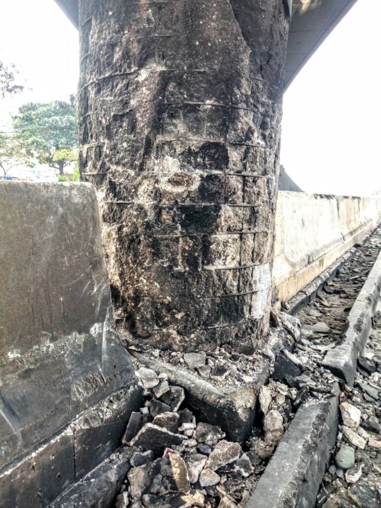 PILLAR TO BADLY BURNT AIRPORT BRIDGE-2