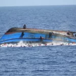 CAPSIZED BOAT
