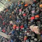 HETHROW TERMINAL 2. BAGGAGE PILE UP
