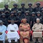arms-bearing avsec sirika seated