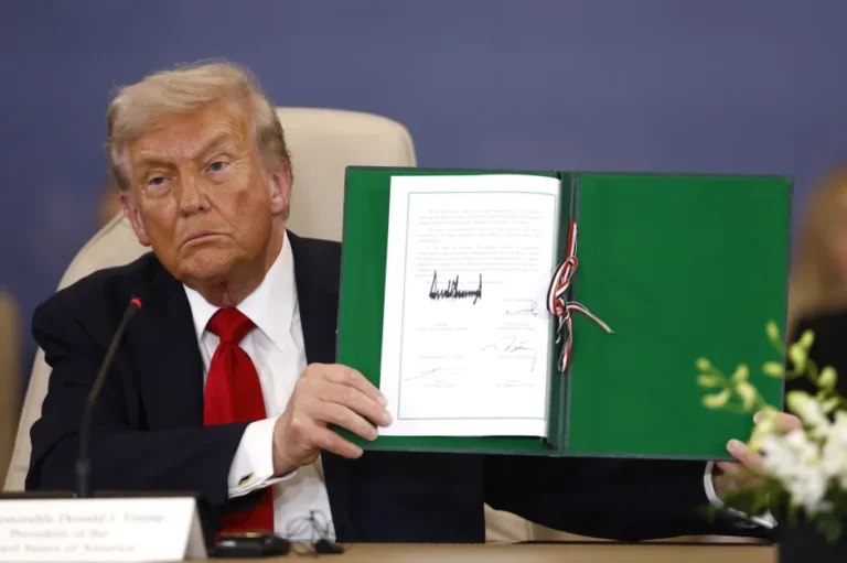 TRUMP DISPLAY SIGNED PEACE DOCUMENT