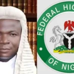 JUSTICE OMOTOSHO WITH FGN INSIGNIA