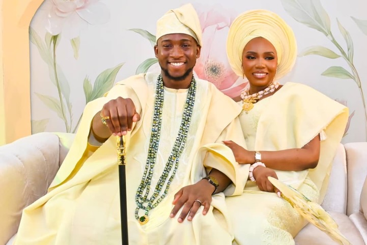 'S WEDDING- COUPLE SEATED